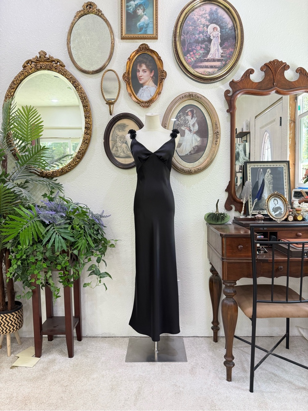 Elegant Black Slip Dress with Floral Strap Detail